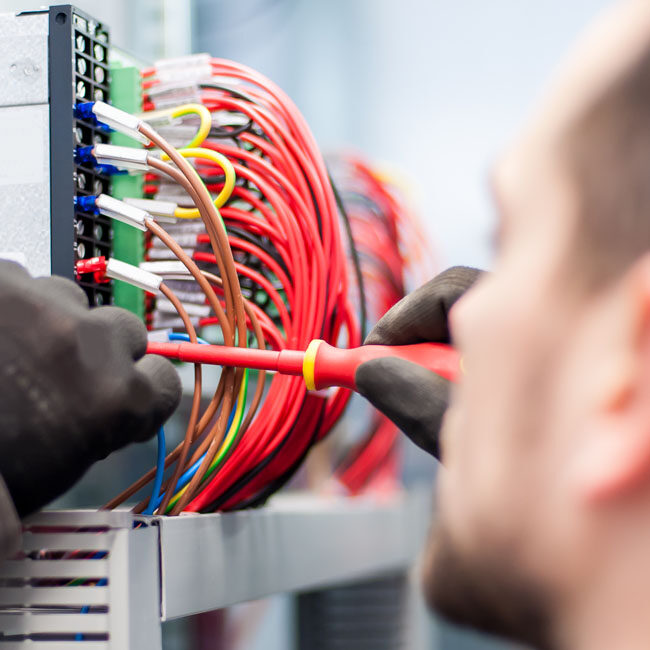 Closeup,Of,Electrician,Engineer,Works,With,Electric,Cable,Wires,Of